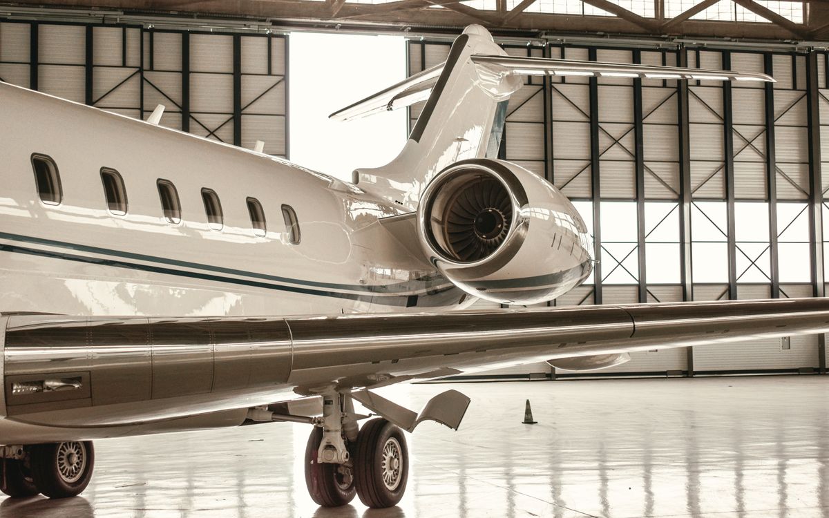 Aircraft in a bright hangar